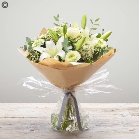 Sympathy hand tied made with the finest flowers